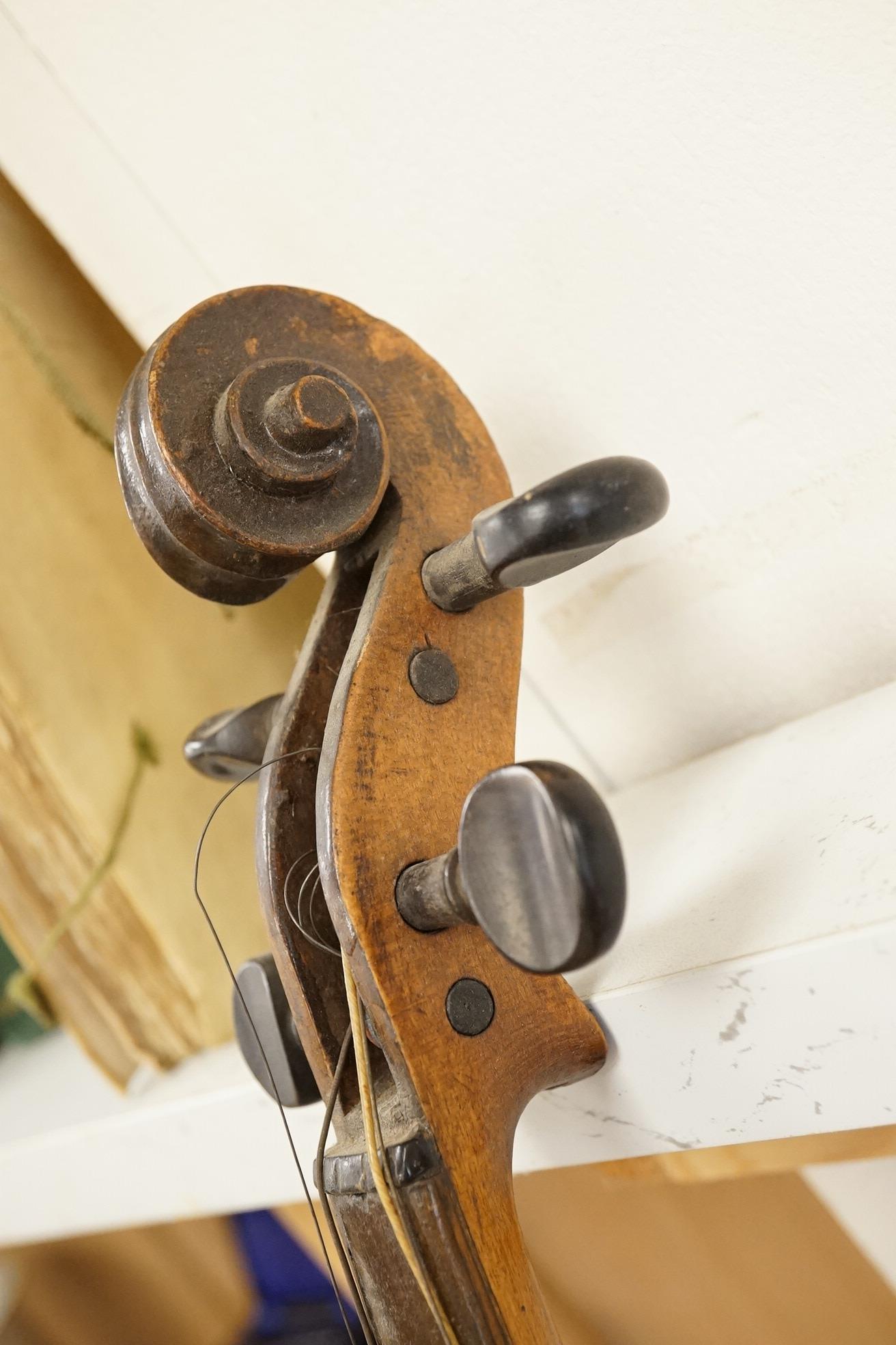 A 19th century violin, and a cased Boosey & Hawkes clarinet